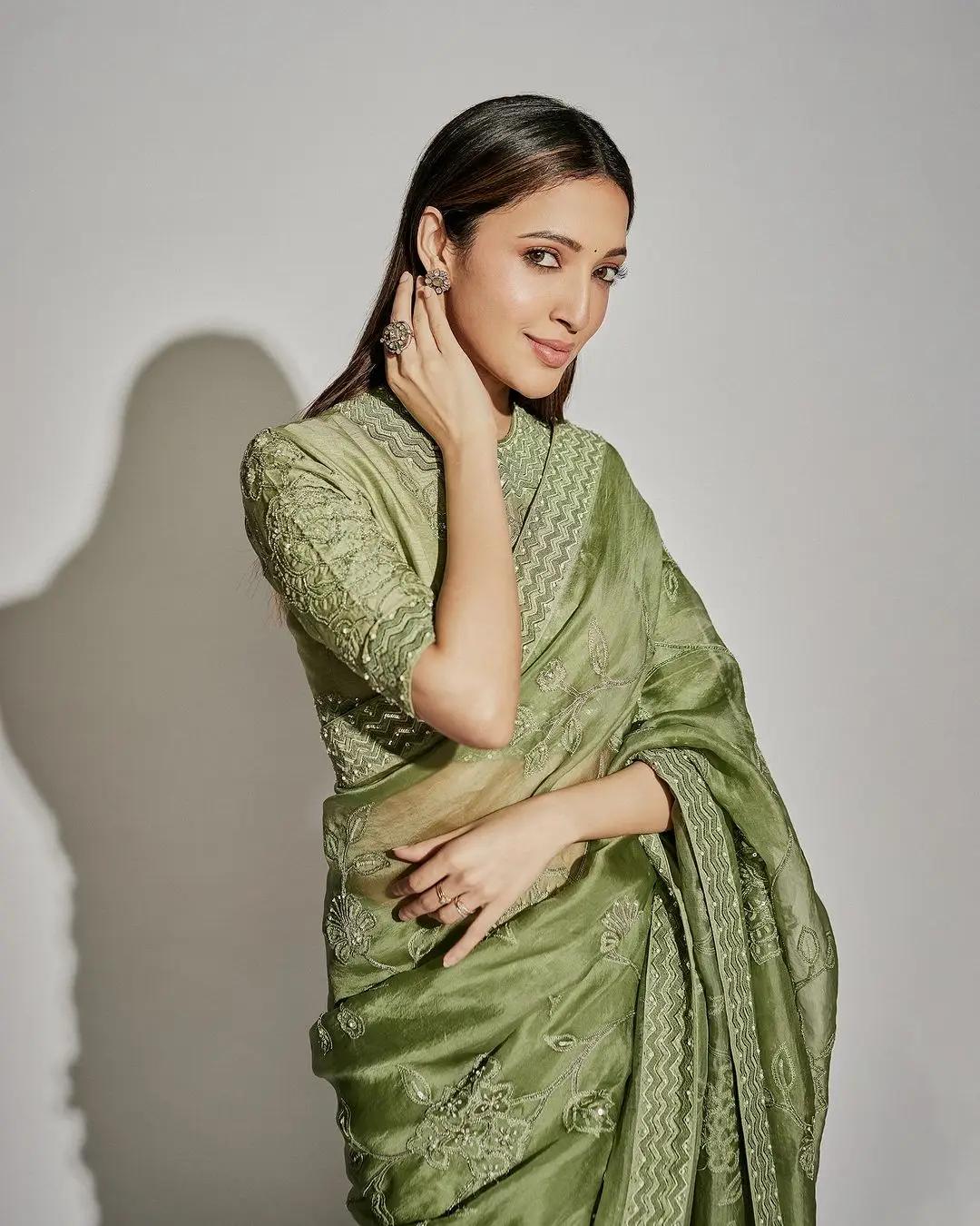 Neha Shetty Wearing Beautiful Earrings Green Designer Saree